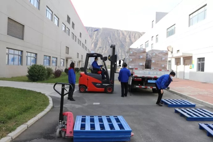 齊心協力做保障 抗疫生產兩不誤